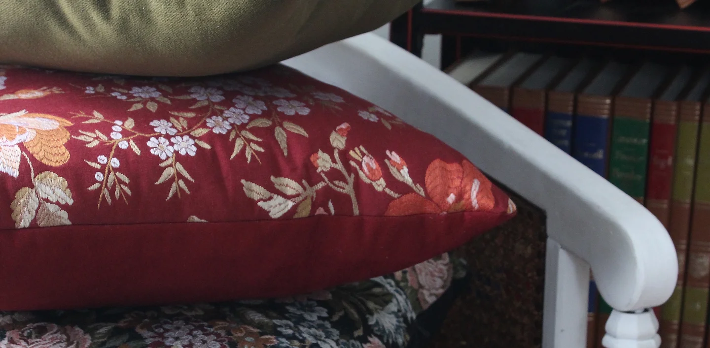 Pillows Stacked in Chair lrg px.JPG