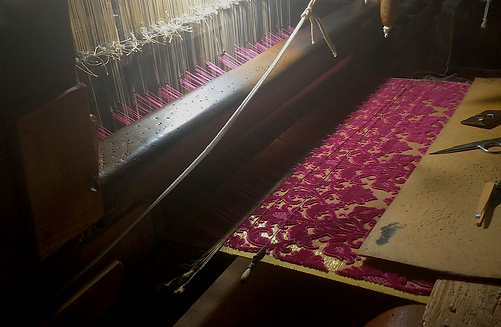 Red-fabric-on-loom-2.png