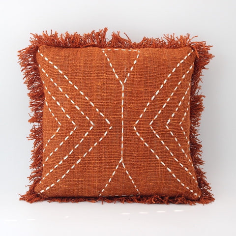 orange throw pillow handcrafted in bali from cotton with geometric designs and ruffles